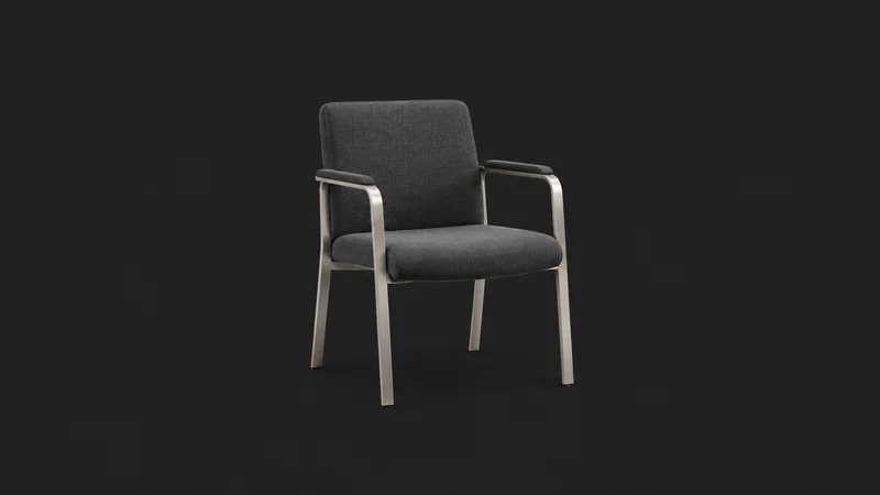 Isolated an empty interview chair with a brushed steel frame centred on a seamless deep charcoal near-black studio background, generous empty margin on every side for overlaid branding