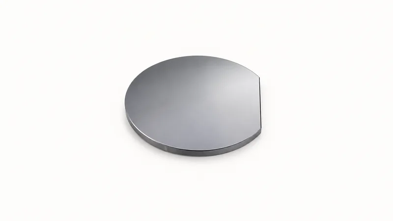 Isolated a polished silicon ingot slice with a flat edge centred on a seamless pale off-white studio background, generous empty margin on every side for overlaid branding