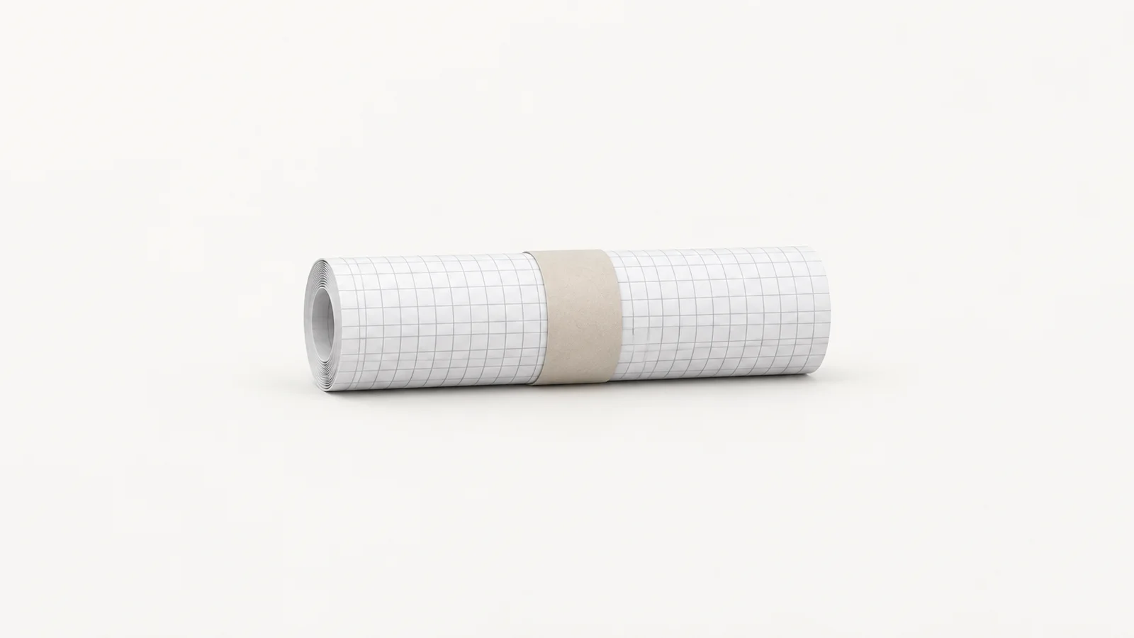 Isolated a rolled roll of printed grid paper held with a band centred on a seamless pale off-white studio background, generous empty margin on every side for overlaid branding