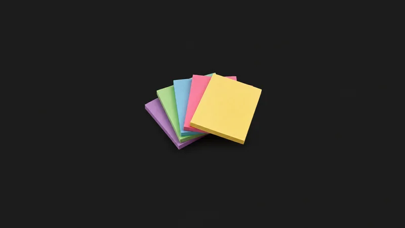 Isolated a set of coloured sticky-note pads in a fan centred on a seamless deep charcoal near-black studio background, generous empty margin on every side for overlaid branding