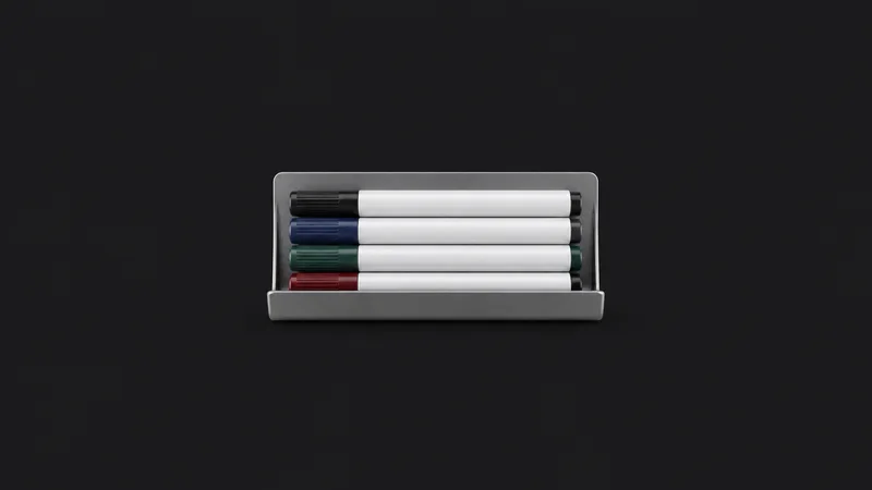 Isolated a whiteboard marker set in a magnetic tray centred on a seamless deep charcoal near-black studio background, generous empty margin on every side for overlaid branding