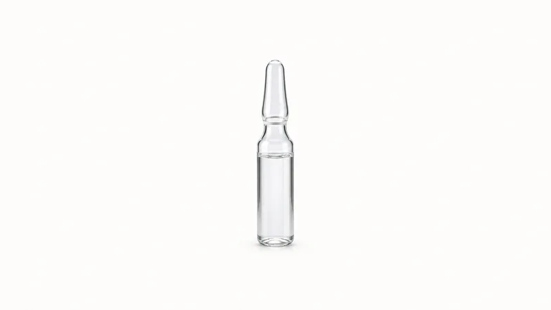 Isolated a sterile glass ampoule with a scored neck centred on a seamless pale off-white studio background, generous empty margin on every side for overlaid branding