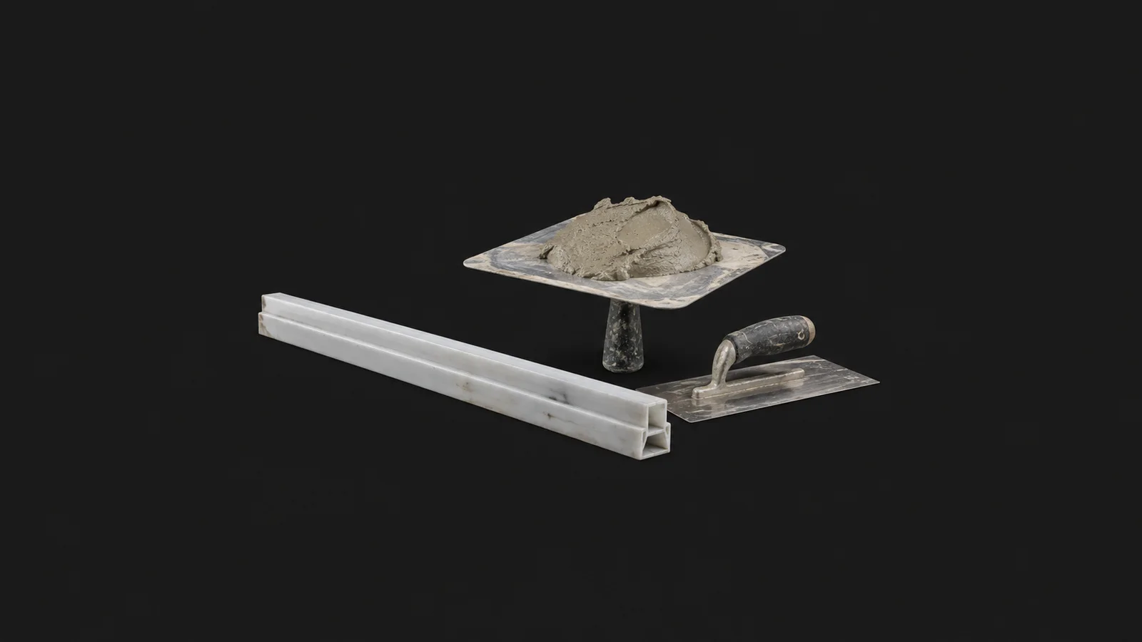 Isolated a plastic screed rail beside a float and a hawk of wet plaster centred on a seamless deep charcoal near-black studio background, generous empty margin on every side for overlaid branding