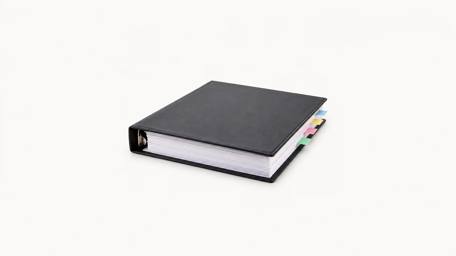 Isolated a blank signature-tabbed closing binder with coloured flags centred on a seamless pale off-white studio background, generous empty margin on every side for overlaid branding