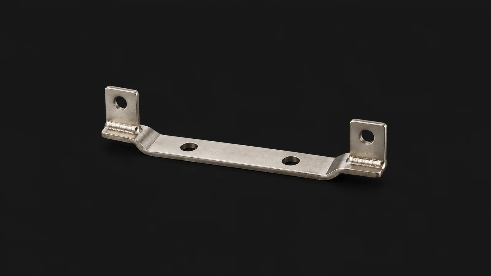 Isolated a nickel-plated busbar with welded tabs centred on a seamless deep charcoal near-black studio background, generous empty margin on every side for overlaid branding