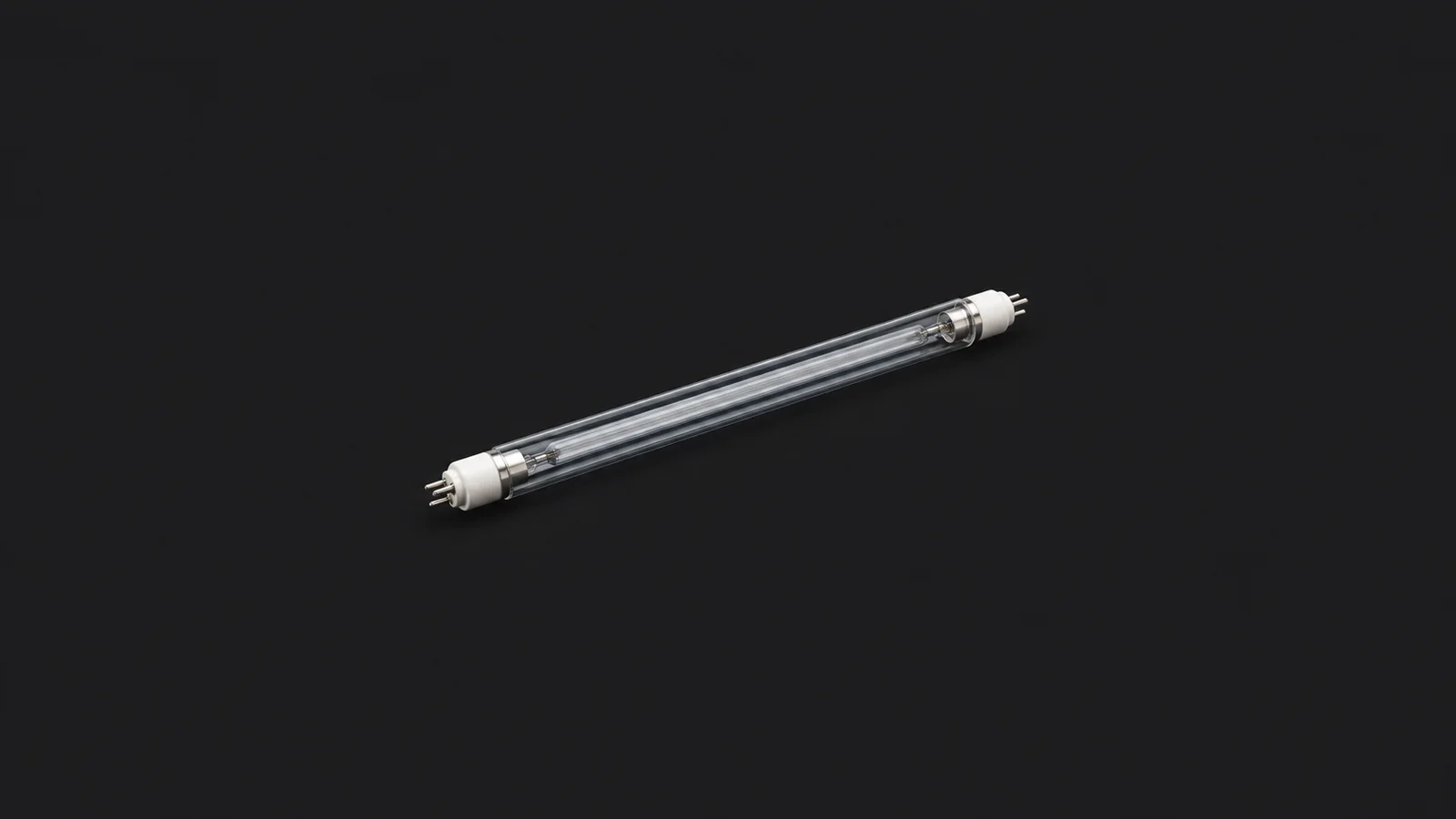 Isolated an ultraviolet lamp tube in a quartz sleeve centred on a seamless deep charcoal near-black studio background, generous empty margin on every side for overlaid branding