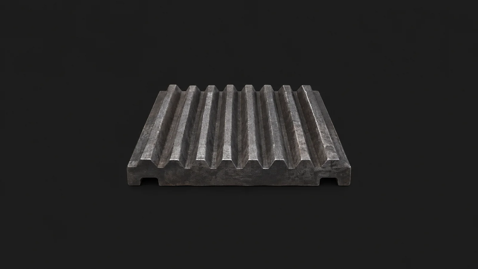 Isolated a crusher jaw plate in manganese steel centred on a seamless deep charcoal near-black studio background, generous empty margin on every side for overlaid branding
