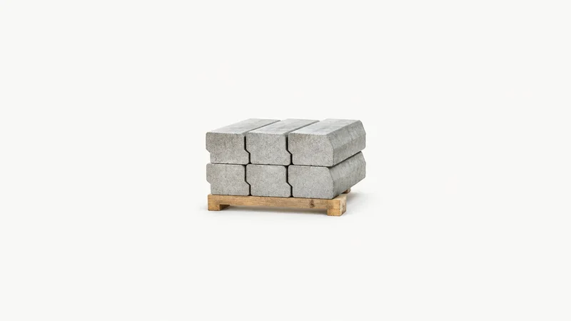Isolated a stack of interlocking concrete kerbstones on a wooden bearer centred on a seamless pale off-white studio background, generous empty margin on every side for overlaid branding