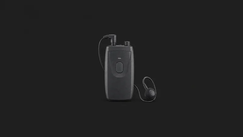 Isolated a portable interpreting receiver with a single earpiece centred on a seamless deep charcoal near-black studio background, generous empty margin on every side for overlaid branding