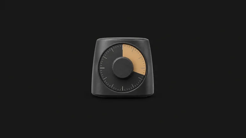 Isolated a small desk timer with a rotating dial for focus sprints centred on a seamless deep charcoal near-black studio background, generous empty margin on every side for overlaid branding