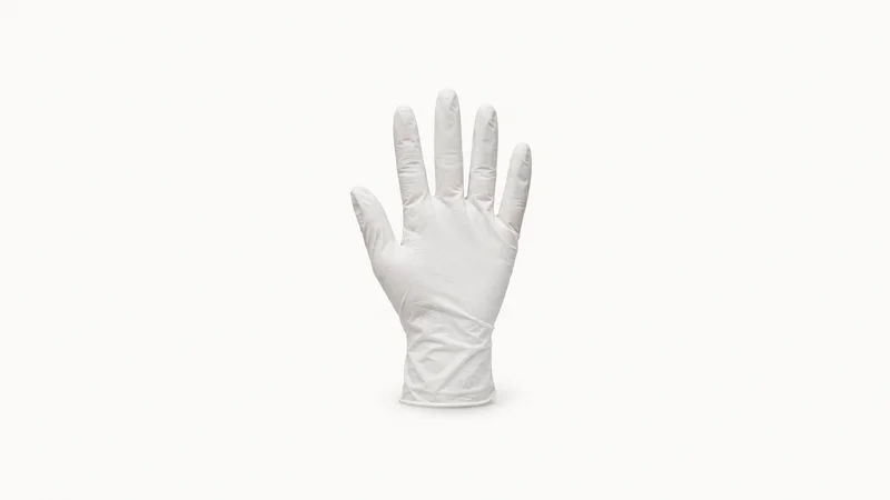 Isolated a fab cleanroom glove of white nitrile centred on a seamless pale off-white studio background, generous empty margin on every side for overlaid branding