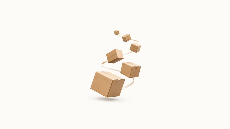 Abstract a cascade of cardboard parcel silhouettes tumbling along a curved route motif centred on a seamless pale off-white studio background, generous empty margin for overlaid branding
