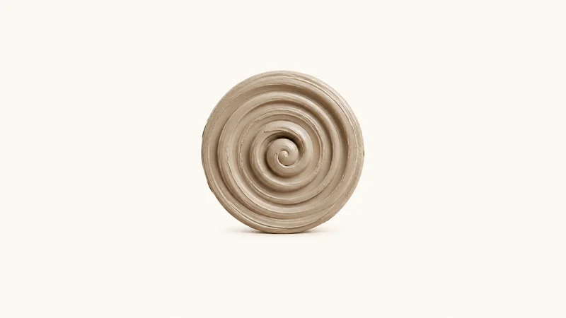 Abstract concentric throwing rings spiralling in wet clay motif centred on a seamless pale off-white studio background, generous empty margin for overlaid branding