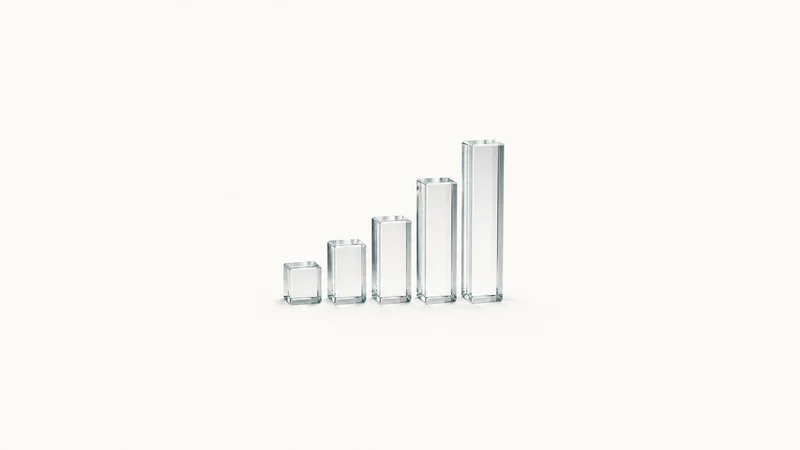 Abstract a rising bar-chart of translucent glass columns motif centred on a seamless pale off-white studio background, generous empty margin for overlaid branding