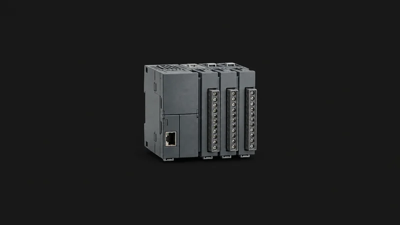 Isolated a DIN-rail PLC controller module without labels centred on a seamless deep charcoal near-black studio background, generous empty margin on every side for overlaid branding