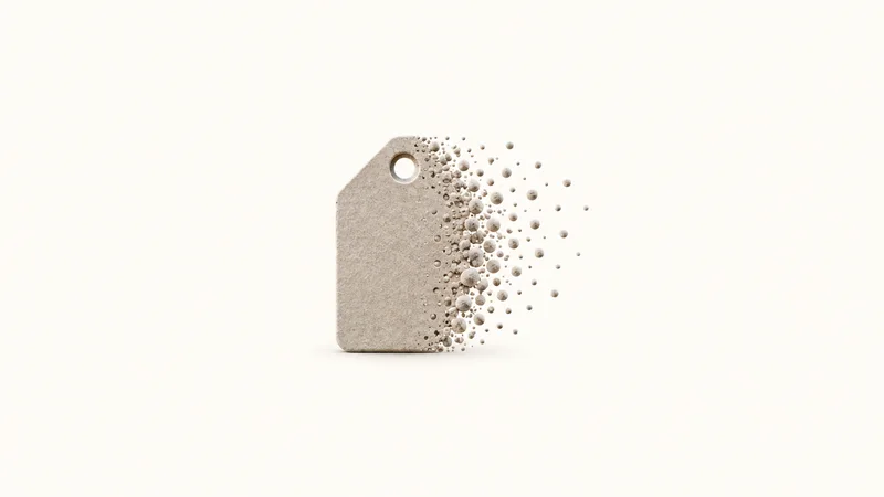 Abstract a price-tag silhouette dissolving into a field of dots motif centred on a seamless pale off-white studio background, generous empty margin for overlaid branding