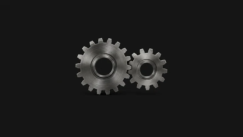 Abstract a meshing pair of gear silhouettes in brushed steel motif centred on a seamless deep charcoal near-black studio background, generous empty margin for overlaid branding
