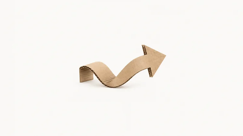 Abstract an arrow of folded corrugated card sweeping across the frame motif centred on a seamless pale off-white studio background, generous empty margin for overlaid branding