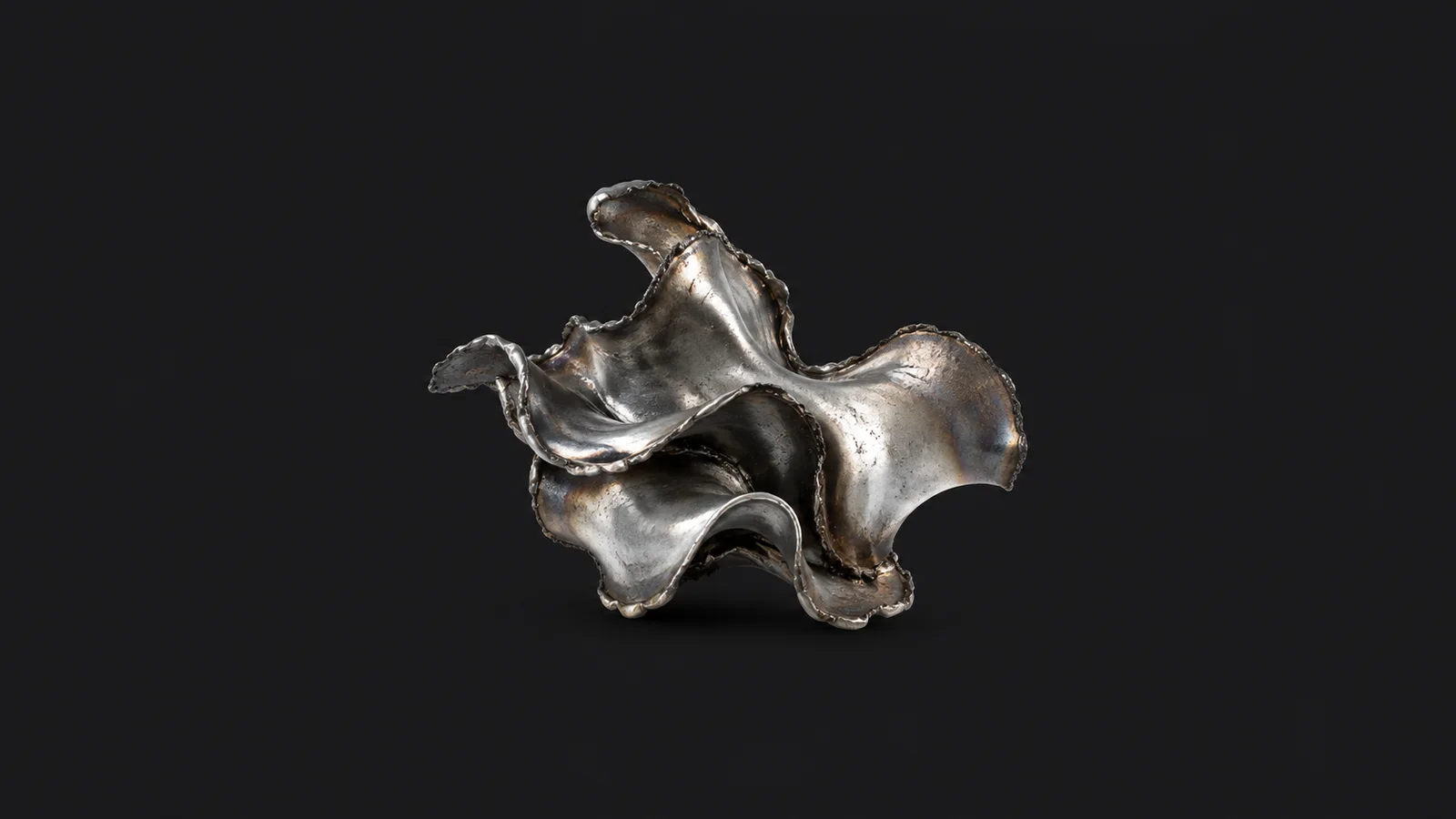 Abstract ripples of molten metal frozen mid-pour motif centred on a seamless deep charcoal near-black studio background, generous empty margin for overlaid branding