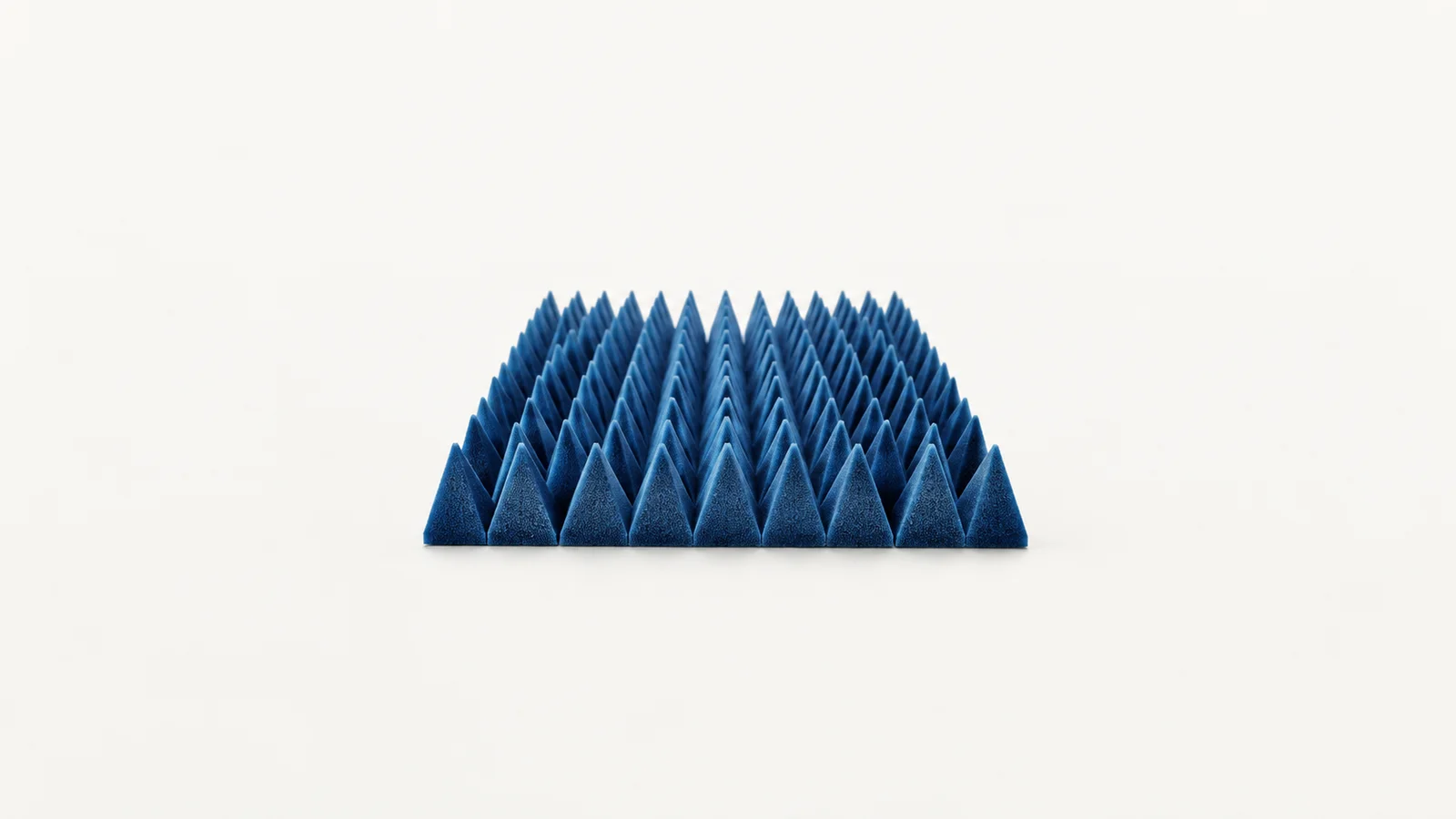 Abstract a field of blue foam pyramids receding to a point motif centred on a seamless pale off-white studio background, generous empty margin for overlaid branding