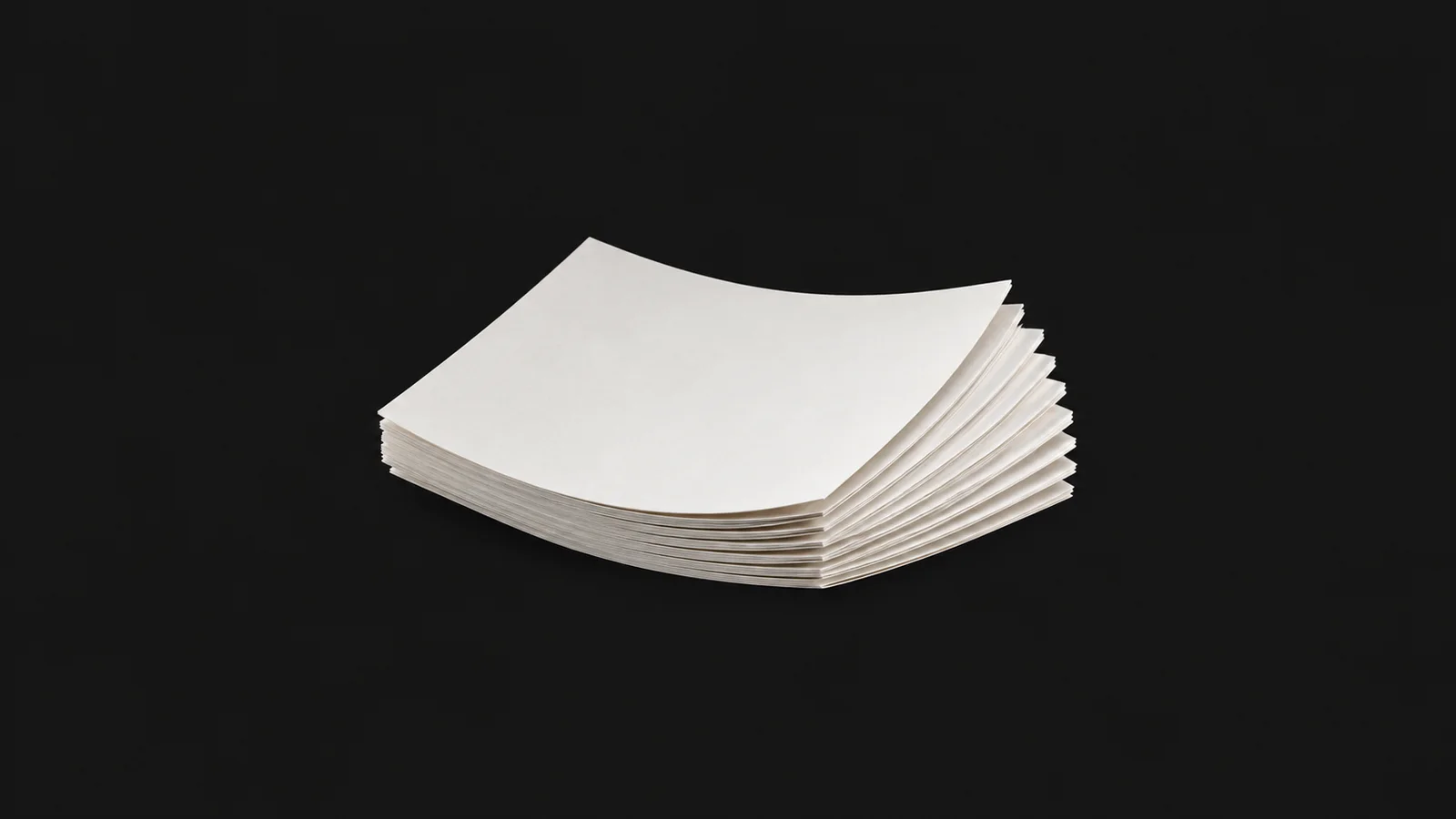 Abstract a stepped stack of press sheets fanned into a shallow arc motif centred on a seamless deep charcoal near-black studio background, generous empty margin for overlaid branding