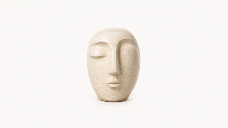 Abstract a crazed glaze crackle pattern across a smooth ceramic face motif centred on a seamless pale off-white studio background, generous empty margin for overlaid branding