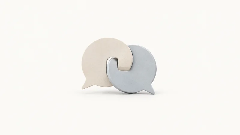 Abstract interlocking speech-bubble planes in two tones motif centred on a seamless pale off-white studio background, generous empty margin for overlaid branding