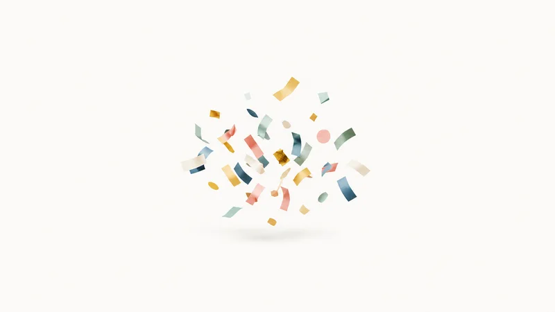 Abstract a burst of coloured paper confetti frozen mid-fall motif centred on a seamless pale off-white studio background, generous empty margin for overlaid branding