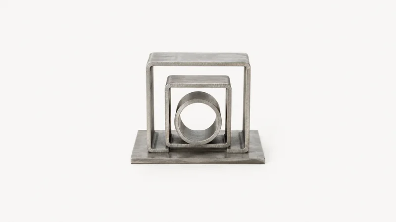 Abstract a nested arrangement of laser-cut steel profiles on a plate motif centred on a seamless pale off-white studio background, generous empty margin for overlaid branding