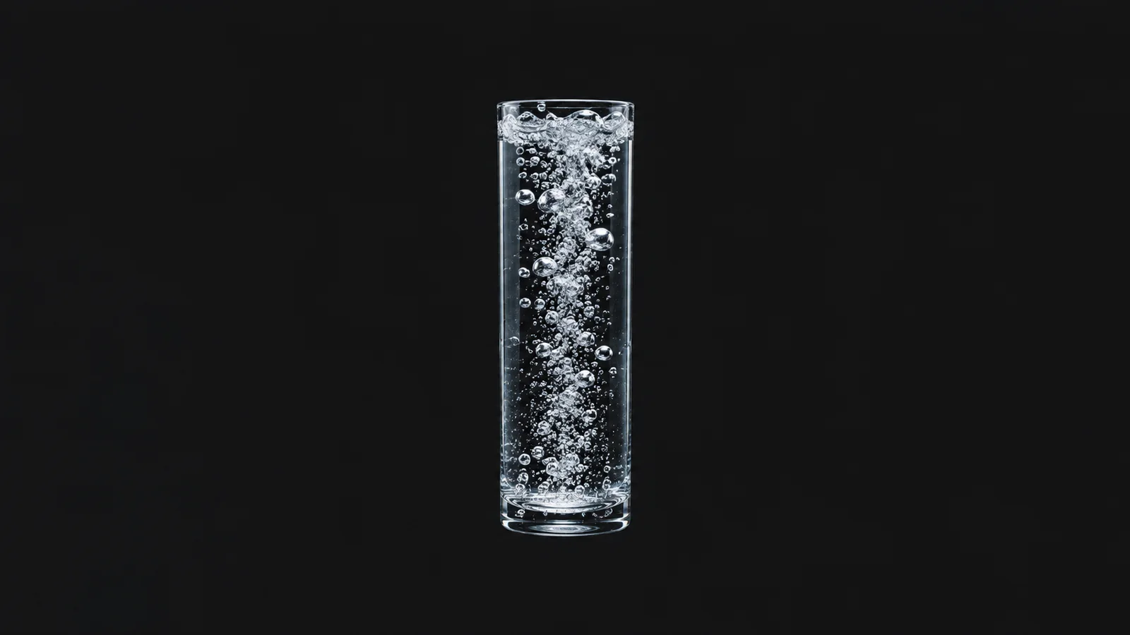 Abstract a cascade of fine bubbles rising through a clear column motif centred on a seamless deep charcoal near-black studio background, generous empty margin for overlaid branding