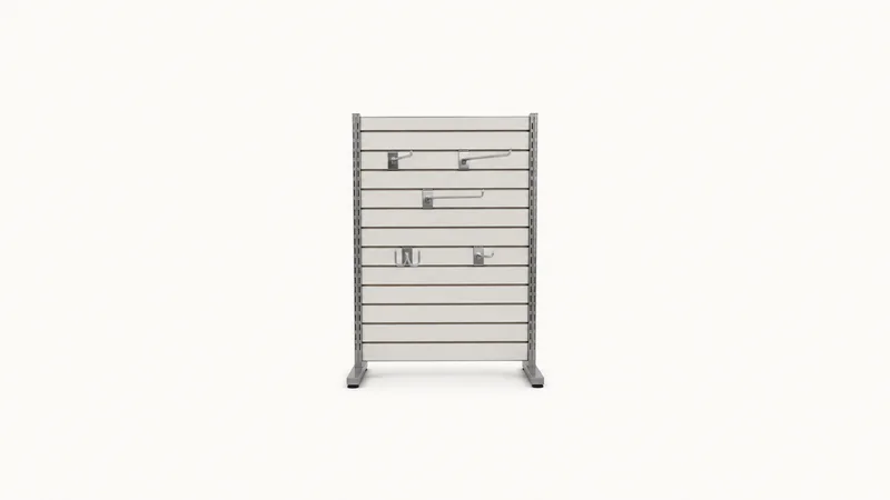 Isolated a slatwall panel with display hooks centred on a seamless pale off-white studio background, generous empty margin on every side for overlaid branding