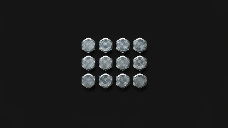 Abstract a grid of zinc-plated bolt heads motif centred on a seamless deep charcoal near-black studio background, generous empty margin for overlaid branding